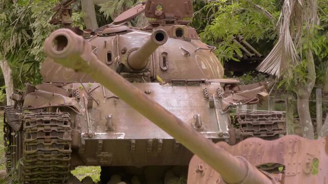 Soviet made tanks T54 are standing on the lawn in Siem Reap War Museum, Cambodia