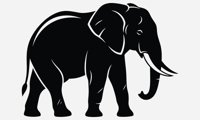 Obraz premium Black silhouette of a majestic elephant with large tusks standing in profile, isolated on a white background. Vector graphic animal illustration