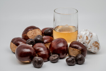 A composition of a typically autumnal fruit, such as the chestnut, which enhances its beauty and details.