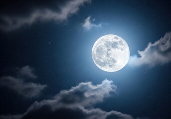 Mysterious full moon shines through dramatic clouds in a dark night sky