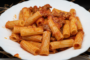 Pasta with sauce, sausage and mushrooms is a very tasty and flavourful first course, substantial and rich even if it requires few ingredients, a dish that can be a first course or a single dish