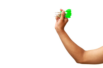A poised hand ready to launch green darts against a stark white backdrop conveying focus