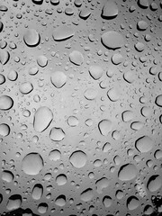 Abstract Water Droplets on Blue Glass Surface Texture