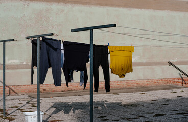 Colorful Clothes Hanging on Clothesline Drying Outdoors