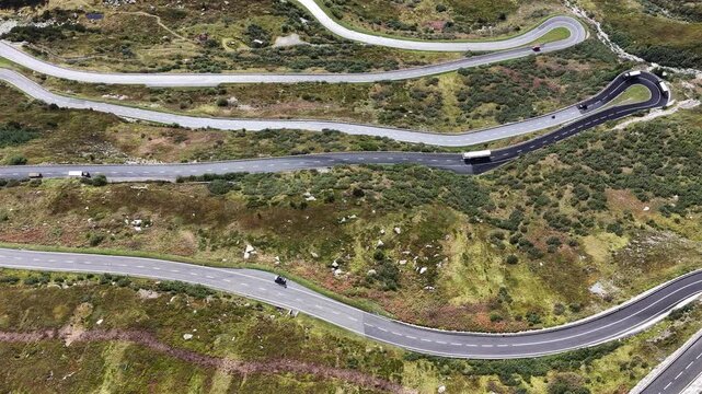 vehicles driving furka pass switzerland