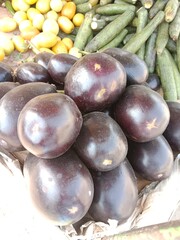 Different vegetables and fruits pile show for sale in the market 
