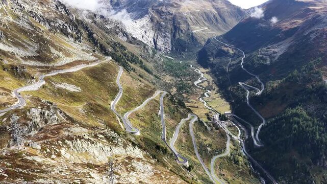 vehicles driving furka pass switzerland