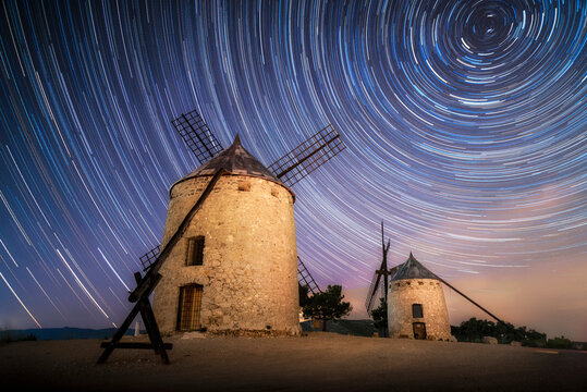 Circumpolar Star Photography Over Alcublas Windmills - Cosmic Trails Over the Silent Windmills