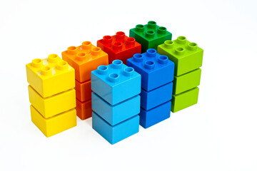 Colorful Stacked Toy Building Blocks on White
