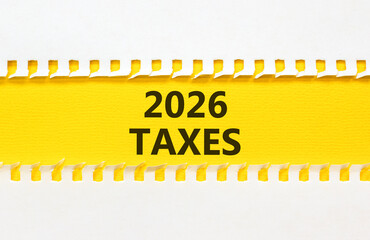 2026 taxes new year symbol. Concept words 2026 taxes on beautiful yellow paper. Beautiful white paper background. Business and 2026 taxes new year concept. Copy space.