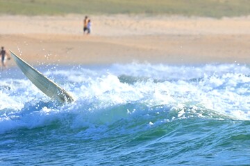 Fototapeta premium Ferrol Atlantic waves in Galicia, Spain. Surfer, ocean wave on Doninos beach
