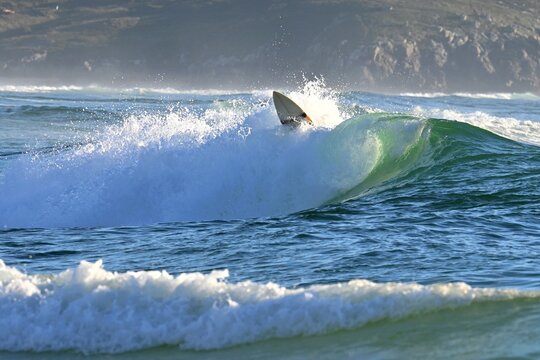 Ferrol Atlantic waves in Galicia, Spain.
Surfer, ocean wave on Doninos beach