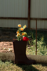 agricultural decor, flowers in boots