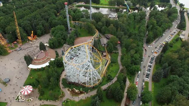 Air coaster excitement, an aerial view of crowded amusement Divo island park