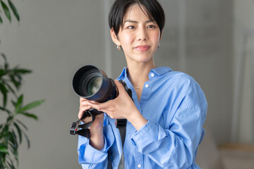 女性　フォトグラファー　カメラマン