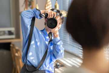 女性　フォトグラファー　カメラマン
