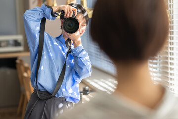 女性　フォトグラファー　カメラマン