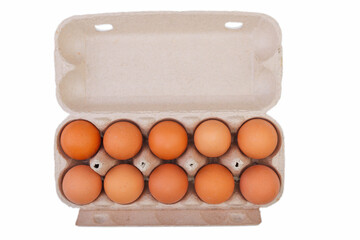 Top view of raw chicken eggs in egg box on on white background.