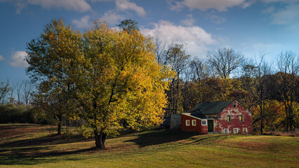 autumn landscape with a barn