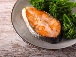 salmon with broccoli on plate