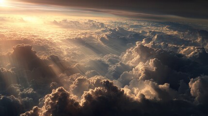 Aerial view of sunbeams breaking through dramatic golden clouds