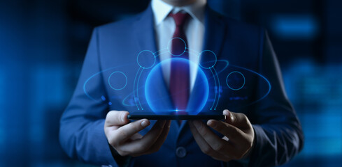 A businessman holds a smartphone. Business Technology Concept