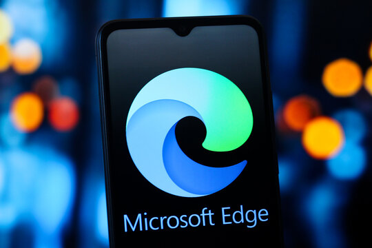 In this photo illustration, the Microsoft Edge browser logo is seen displayed on a smartphone screen.