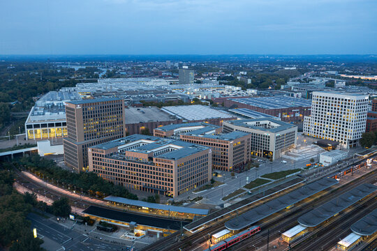 Evening view of Cologne Koelnmesse and railway tracks