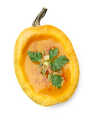 Tasty pumpkin cream soup with seeds and parsley isolated on white, top view