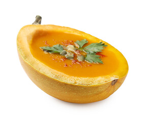 Tasty pumpkin cream soup with seeds and parsley isolated on white