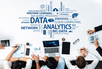 Diverse team engaged in data analysis using technology, showcasing graphs and charts that emphasize statistics and insights for informed business decisions. Amity