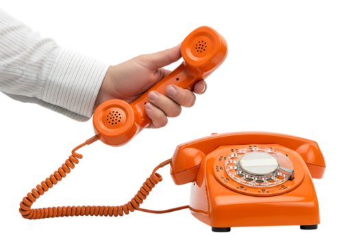Hand holding an orange vintage telephone isolated on transparent background, ready to answer