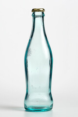 Clear glass bottle on white background, minimalistic blank container ideal for mockup and product presentation.