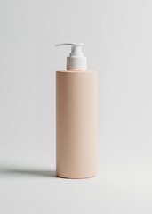 Vertical studio shot of a sleek matte blush-colored dispenser for soap or body lotion