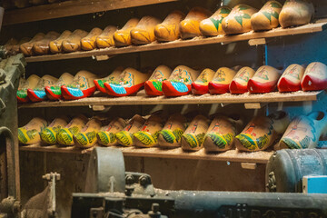 Classic wooden clogs in a display cabinet in an old factory in the Netherlands