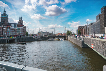 Amsterdam, Netherlands, August 20, 2025, view of a canal in a cosmopolitan city