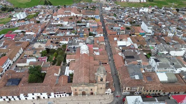 Main square of Tunja Colombia, Colonial park with historic buildings, Aerial drone view of central plaza in Boyaca. High quality 4k footage