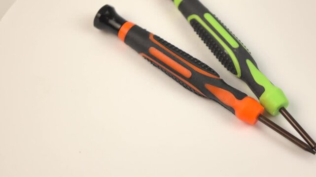 screwdrivers on rotating background. work tools