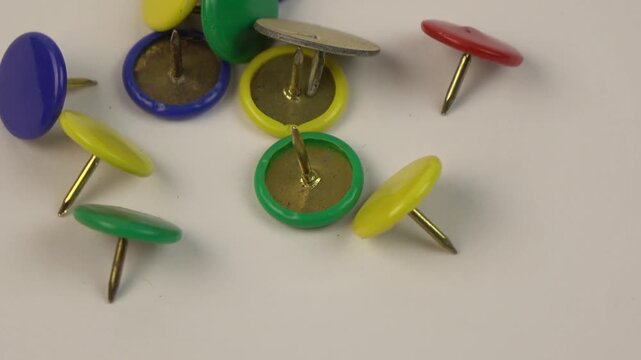 push pins on rotating background