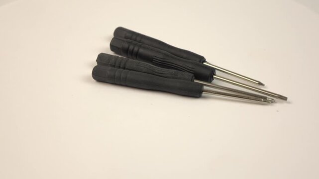 screwdrivers on rotating background. work tools