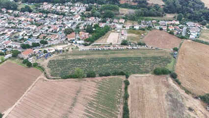 Aerial view of countryside landscape with small town and farmland