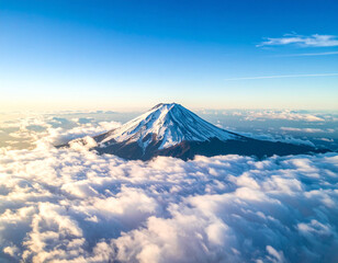 Majestic Snow-Capped Mount Fuji Rising Above a Sea of Clouds at Sunrise.