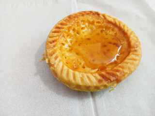 Milk pie with honey on a white background