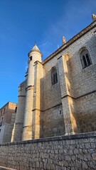 Historic architecture of tordesillas church against blue sky