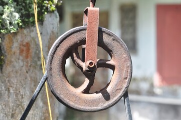 Close-Up of Rusty Metal Pulley Wheel with Vintage Texture