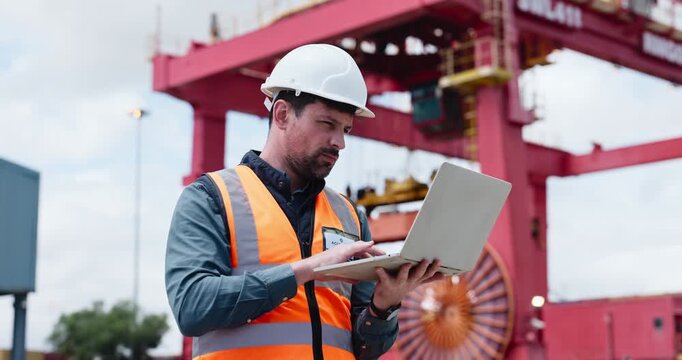 Man, logistics and laptop at port, typing and thinking for supply chain management, export or review. Person, computer and report with distribution schedule, shipping or container transport in Spain