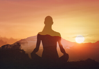 Mental health, well-being, Woman in yoga pose, zen, calming, quiet meditation at sunset. Healthy...