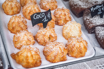 Fresh coconut rocher or macaroon cookies with price tags displayed at the Cours Saleya street market in the Old Town or Vieille Ville, Nice, France