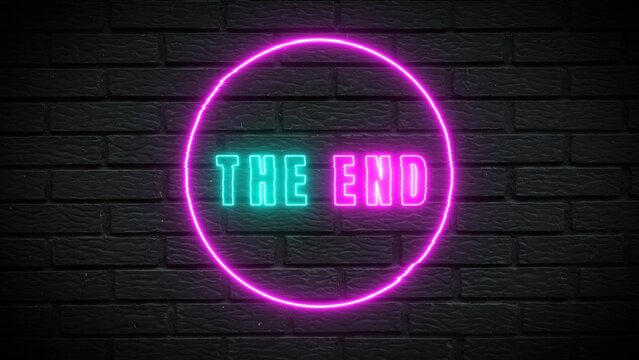 Dramatic neon sign on dark brick wall declaring the end of a chapter, perfect for a film or creative project closing scene