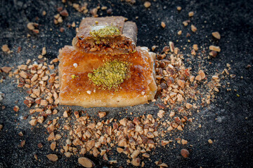 Traditional Palestinian Kulaj Sweet with Cheese  or Walnut Filling and Pistachio Garnish 